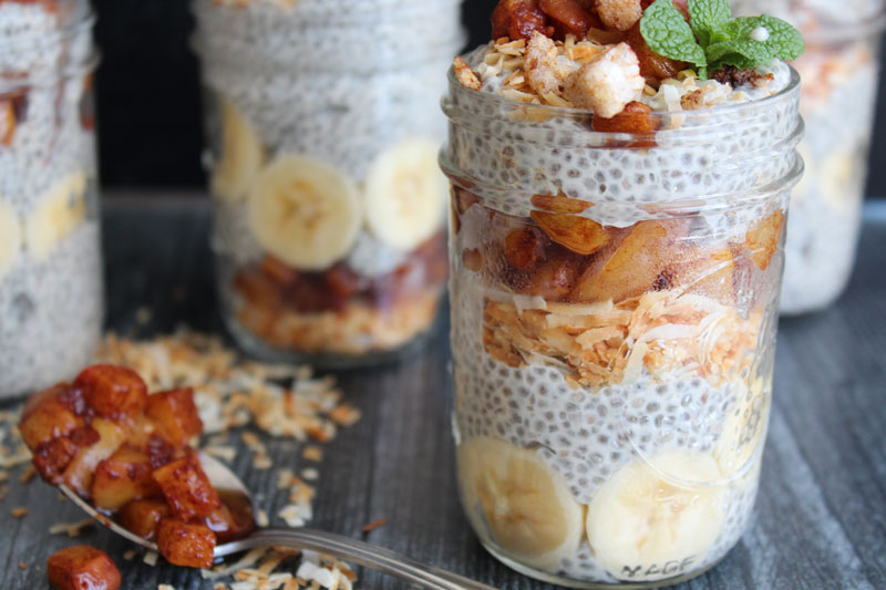A side photo of the chia cereal layers with peach compote, banana and toasted coconut