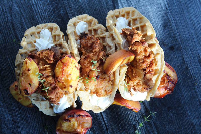 three fried chicken and waffle tacos