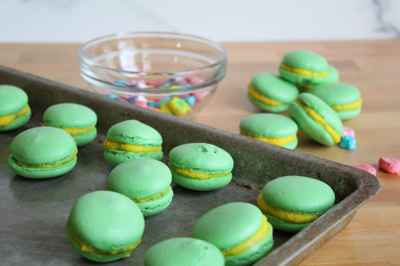A tray of green lucky charm macaroons